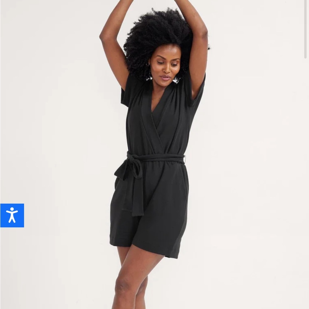 Nursing romper brand new in plastic